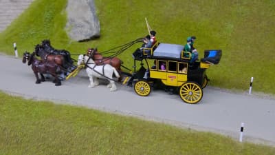 Nostalgia with a stagecoach and an Eb 3/5 steam locomotive